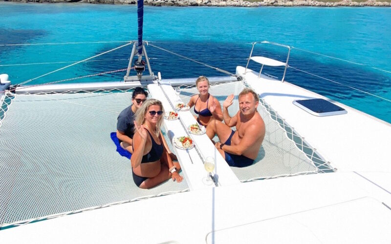 People relaxing on a luxury yacht at sea