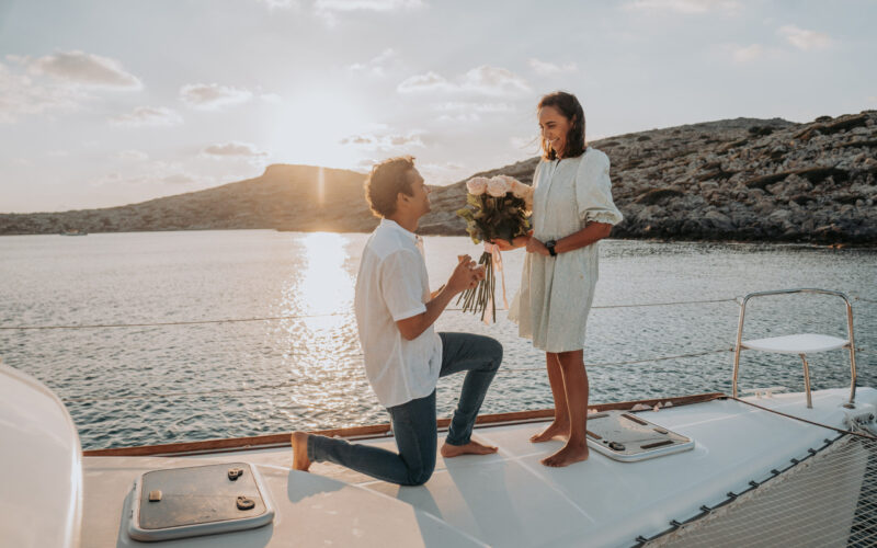 Man proposes on a luxury yacht at sunset
